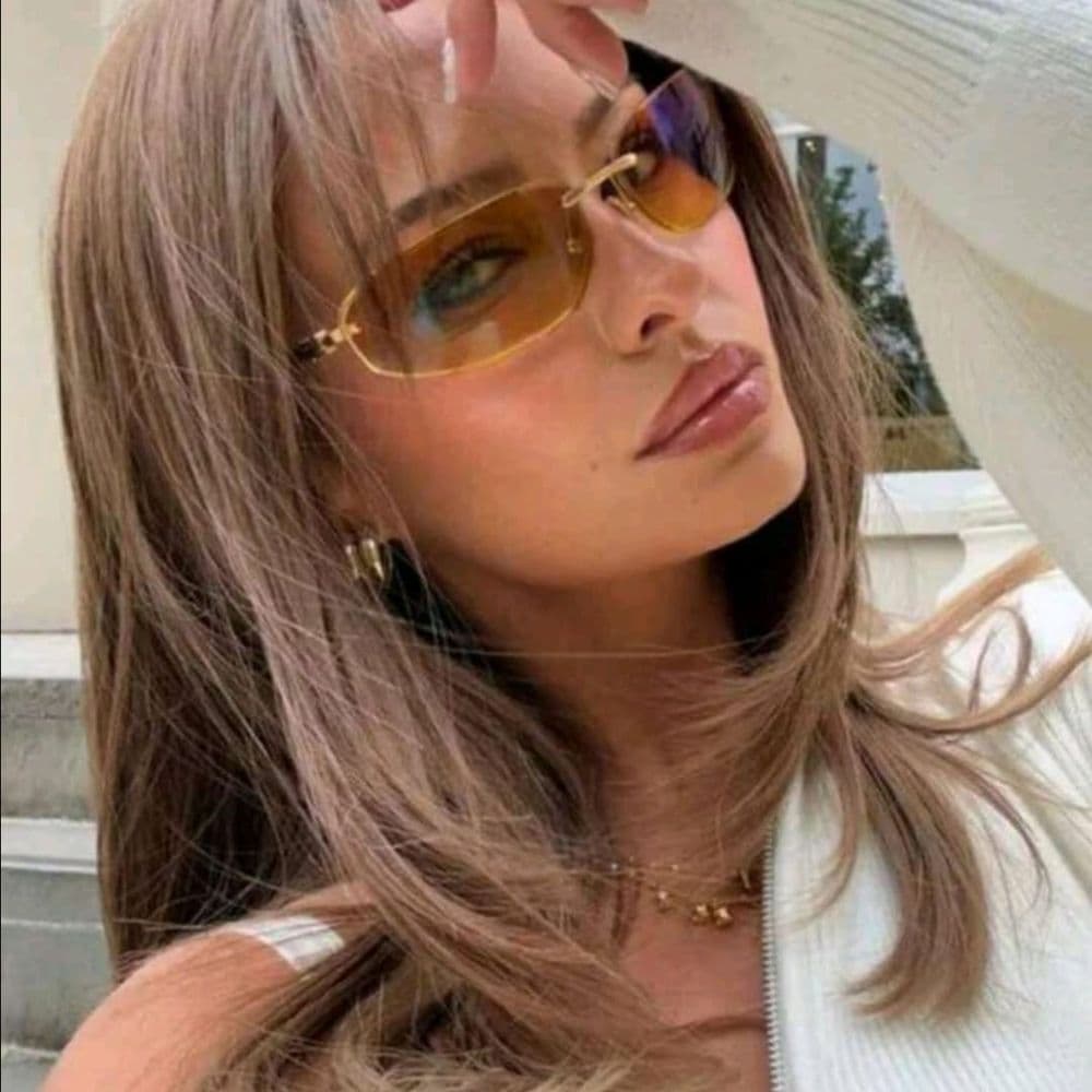LENTES DE SOL MIU ALARGADOS