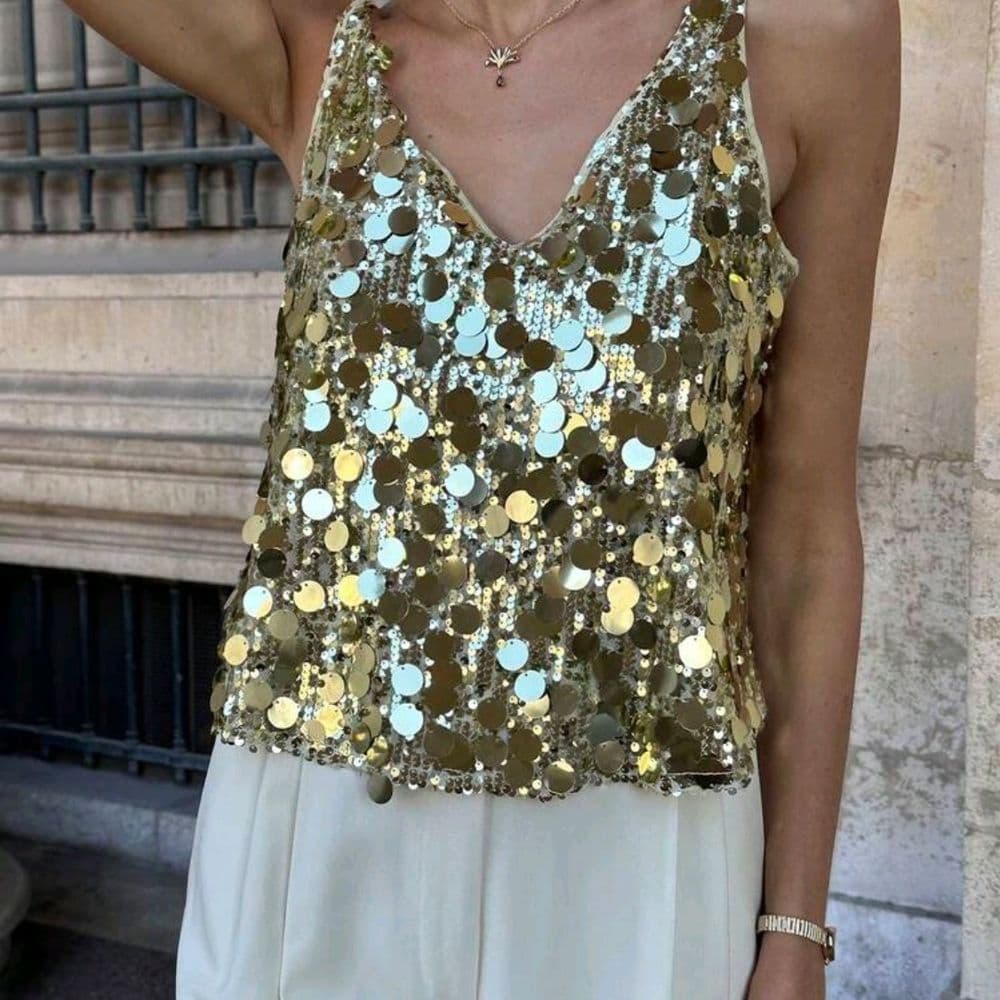 Blusa de lentejuelas doradas