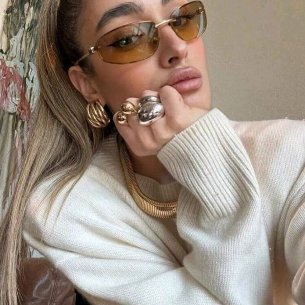 LENTES DE SOL MIU ALARGADOS