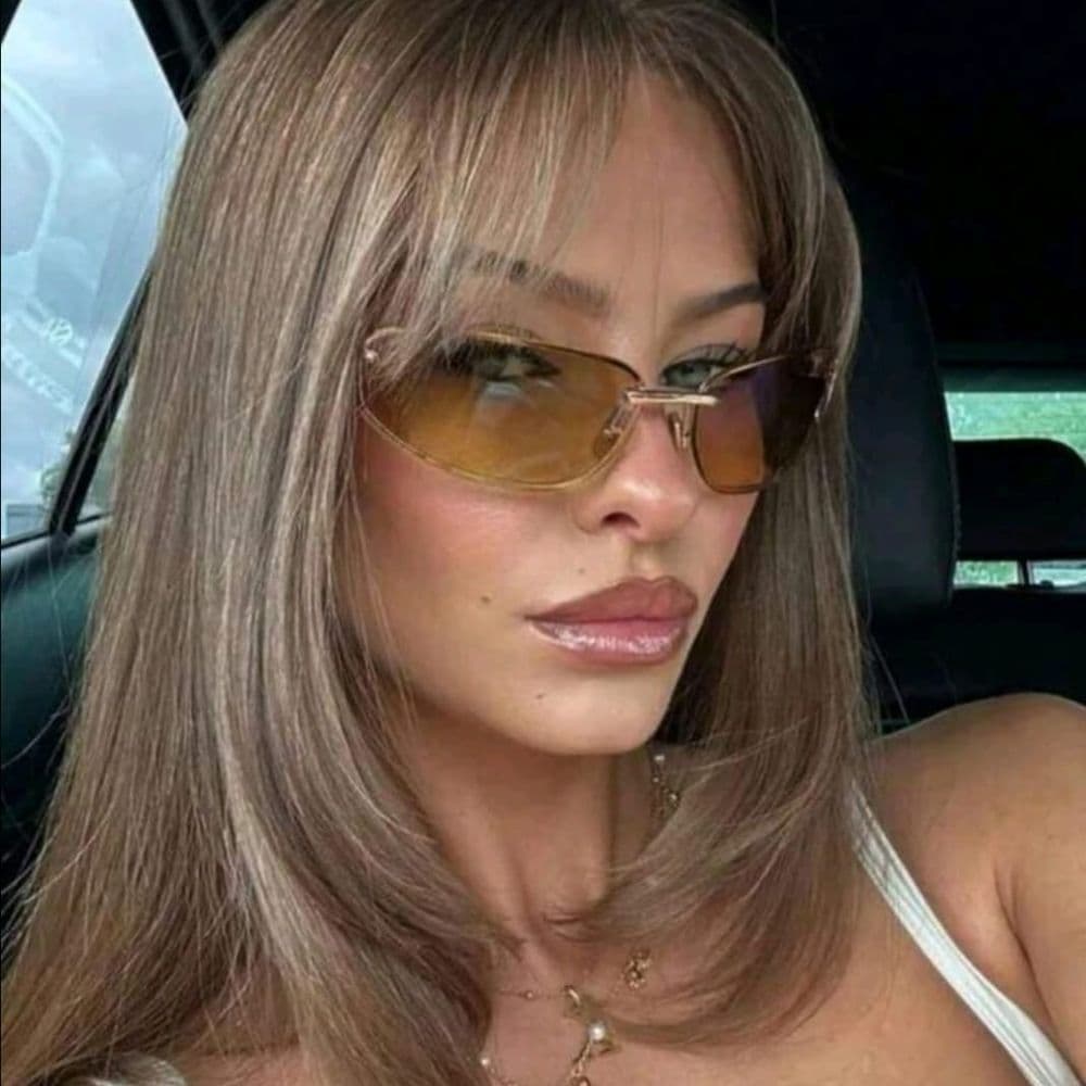 LENTES DE SOL MIU ALARGADOS